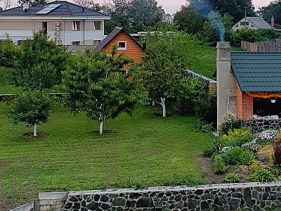 Villa Village у селі Слобода біля Черкас — комфортний відпочинок біля Дніпра з чаном, сауною, басейном і затишним будинком лише для вашої компанії.